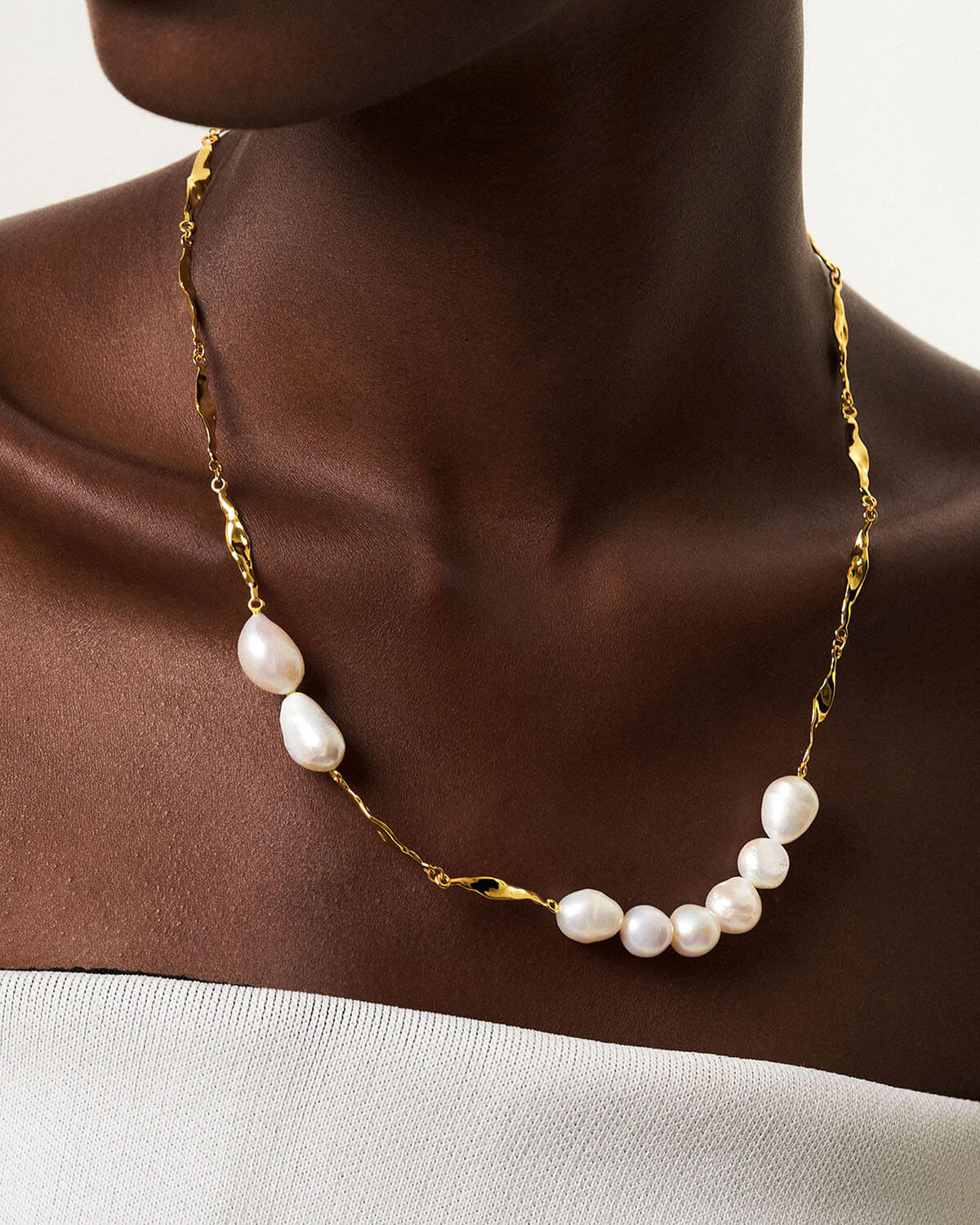 Discover the allure of irregular beauty with our Baroque Pearl Necklaces