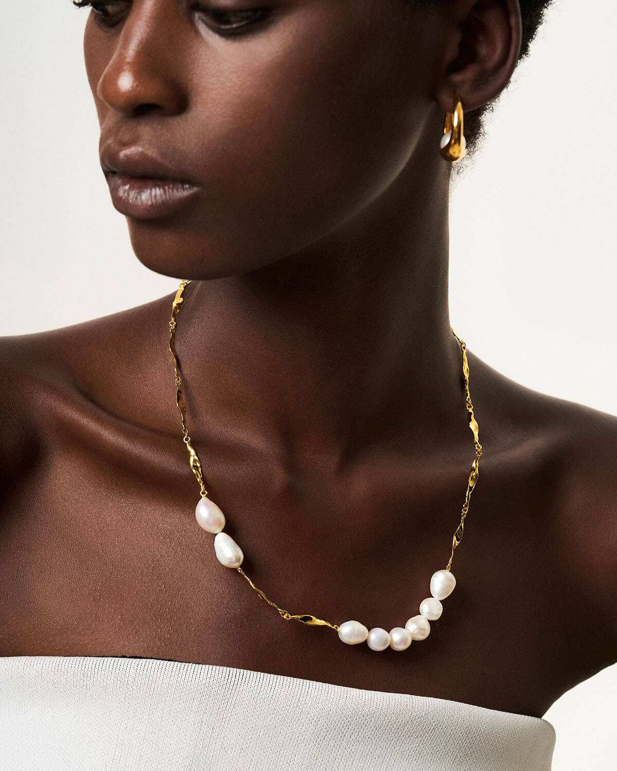 Elevate your jewelry collection with the unmatched charm of Baroque Pearl Necklaces