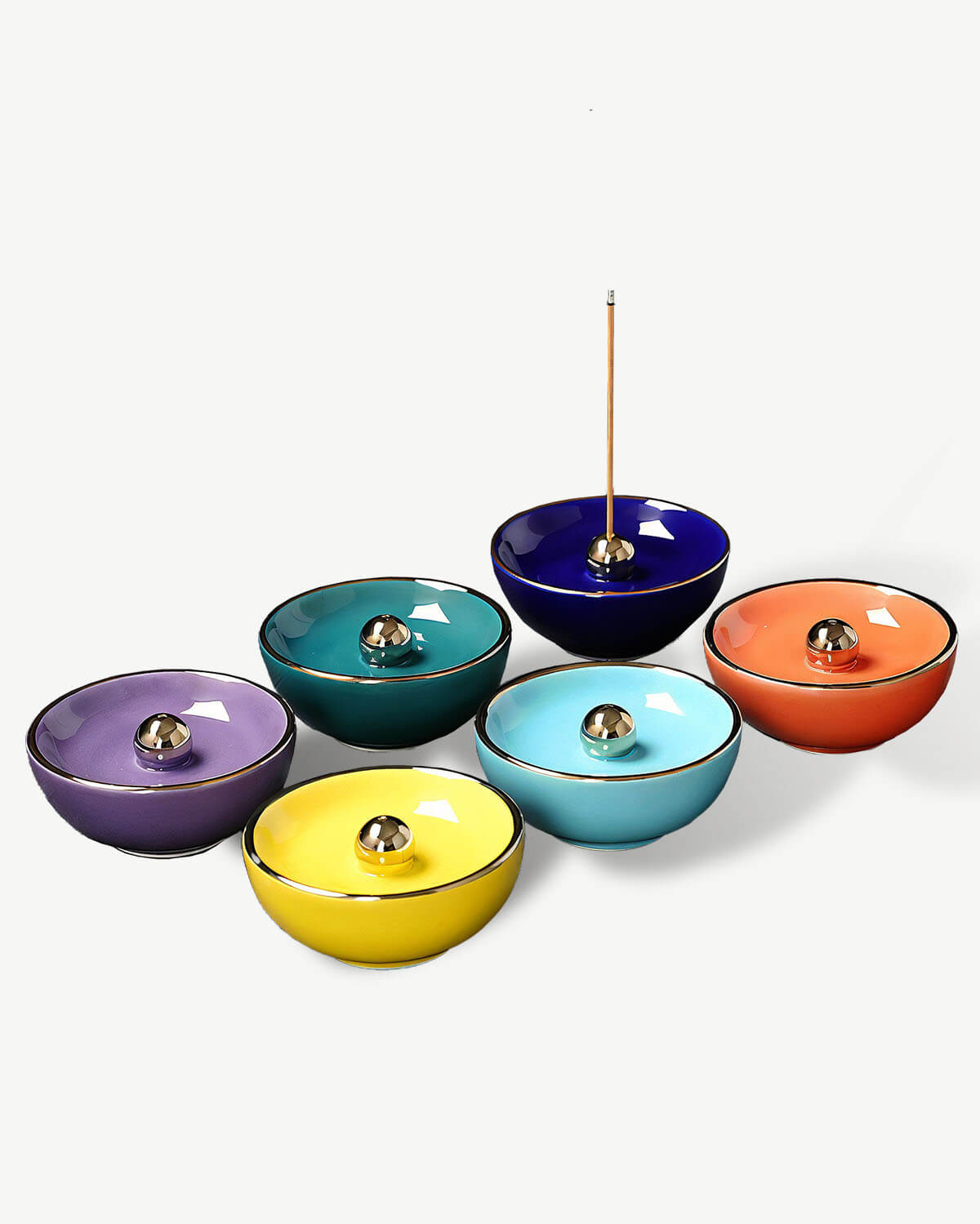 a group of bowls with a toothpick in them