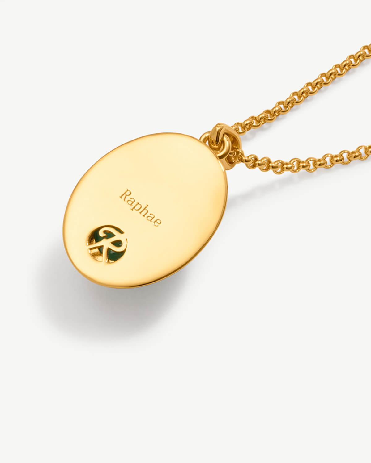 a gold plated necklace with the name of a person on it