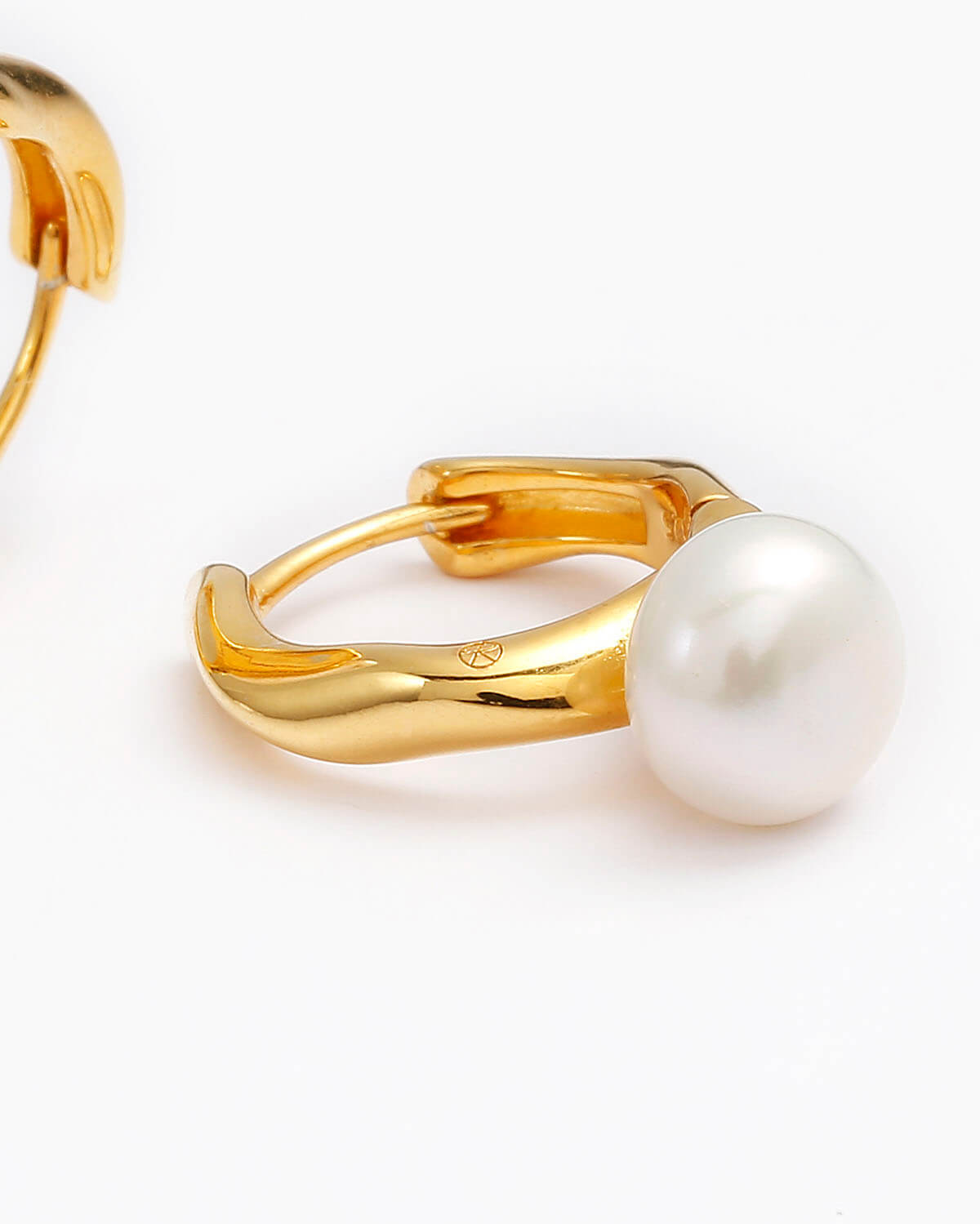 Chic and Sophisticated: Discover Our Collection of Pearl Hoop Earrings