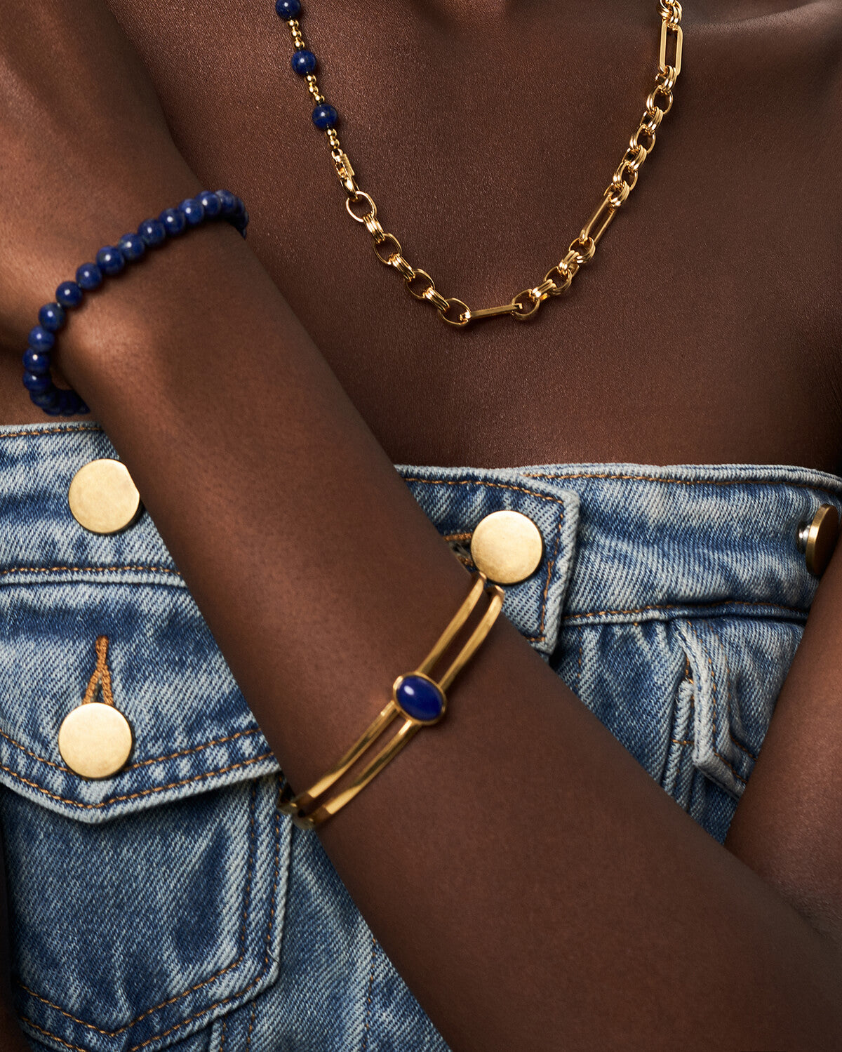 a close up of a person wearing a bracelet