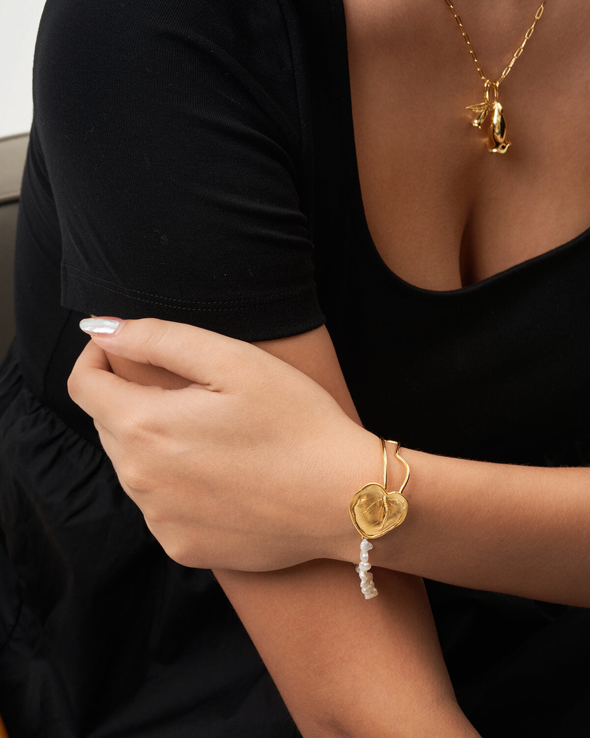 a close up of a person wearing a bracelet