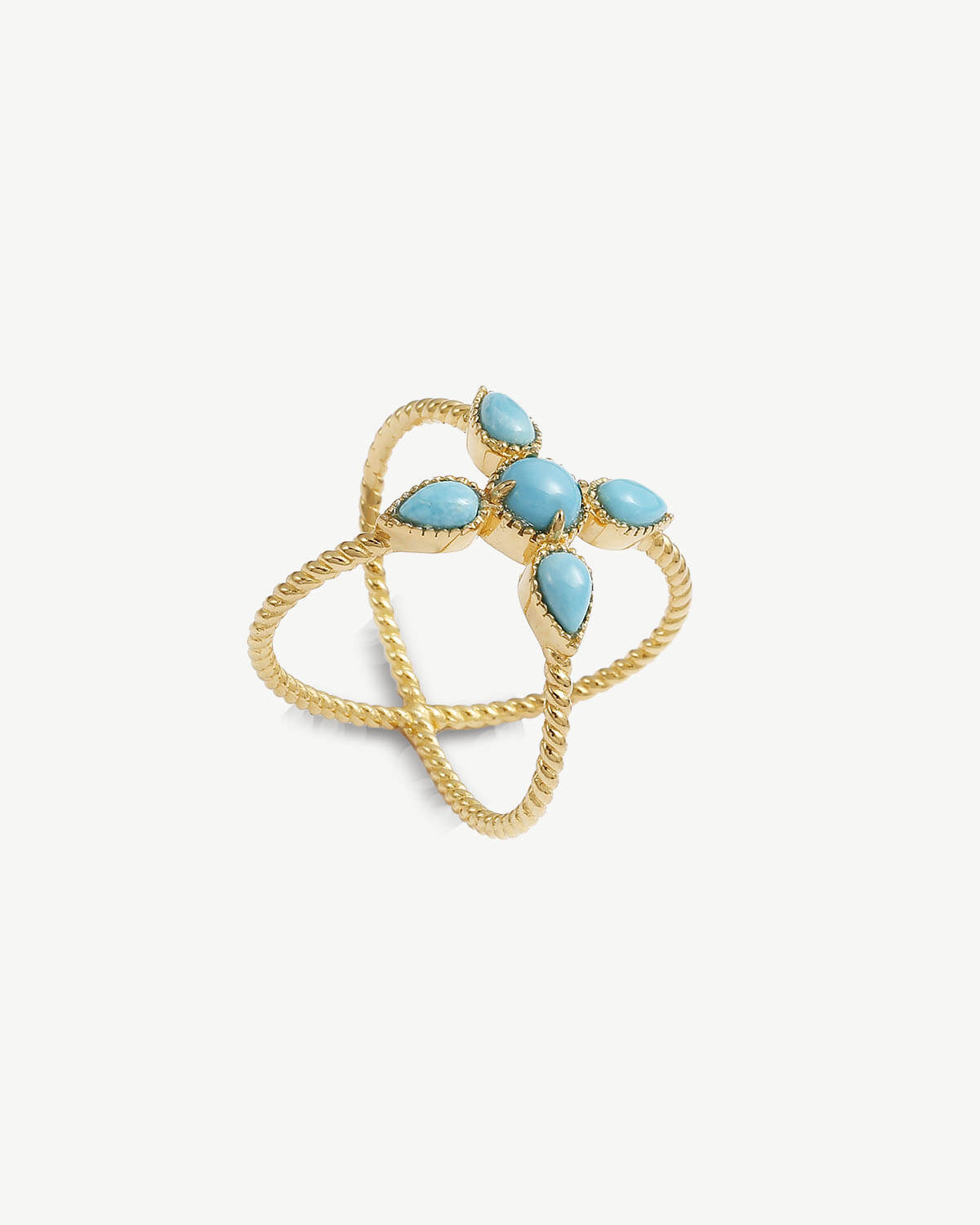 a gold ring with turquoise stones on it