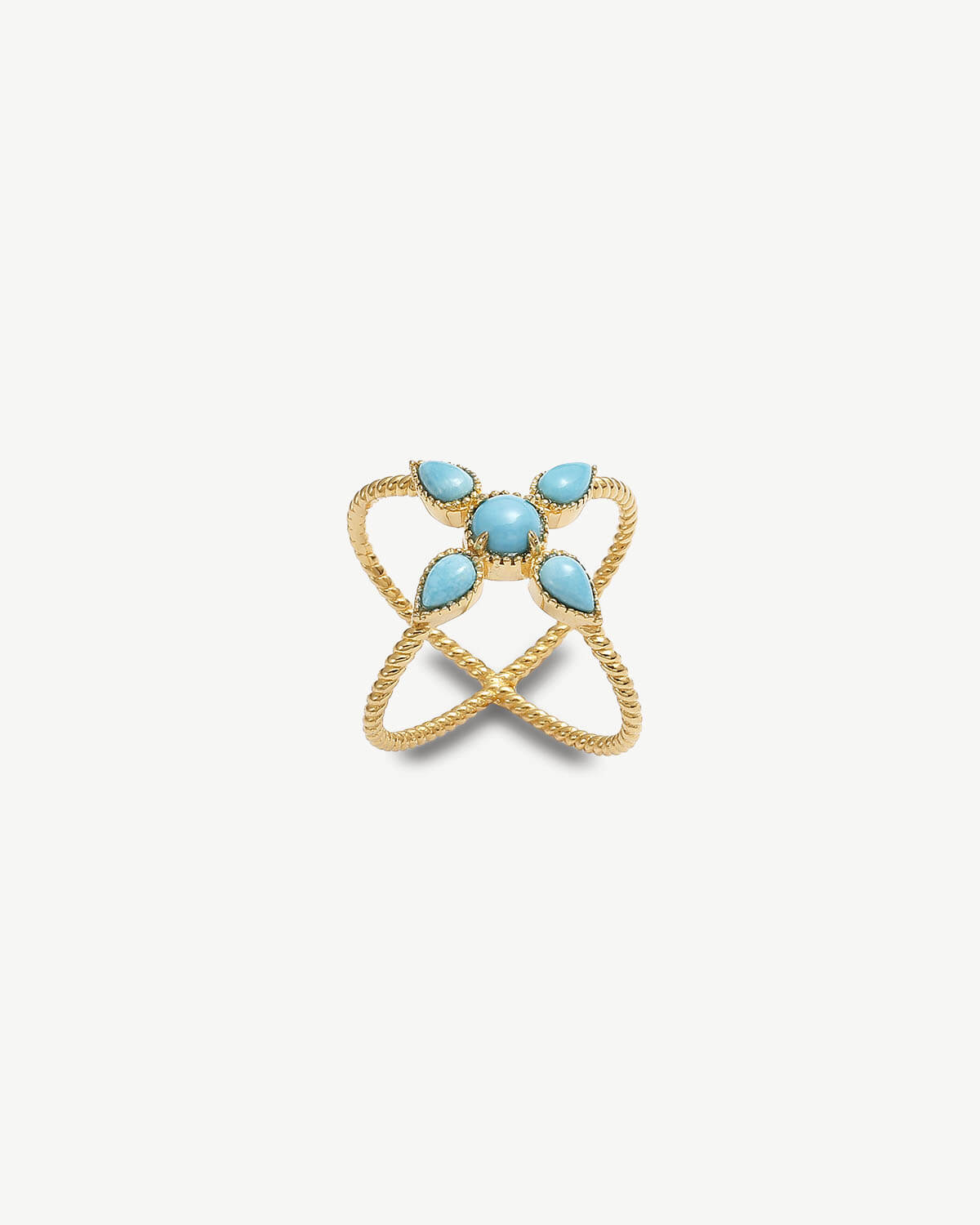 a gold ring with turquoise stones on it