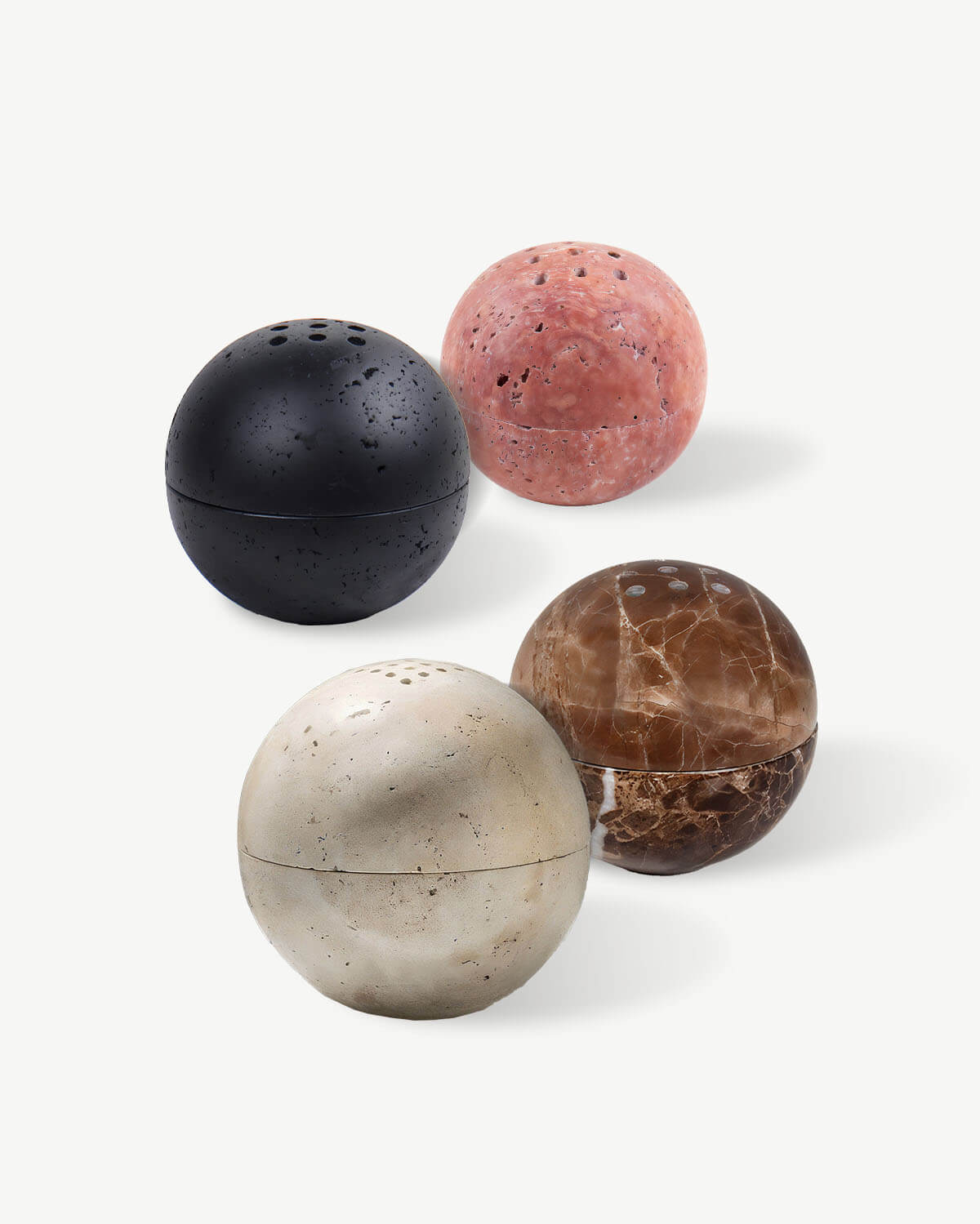 a group of three balls sitting next to each other